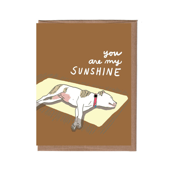 Card with a dog illustration and 'you are my sunshine' text on a brown background
