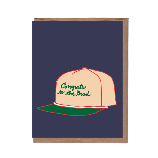 Card with a cap design and 'Congrats to the Grad' text on a navy background