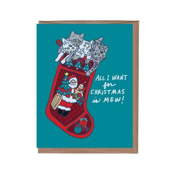 Christmas card with a stocking and cats on a teal background