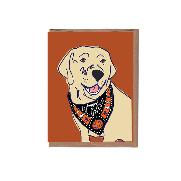 Card with a dog wearing a Halloween bandana on an orange background